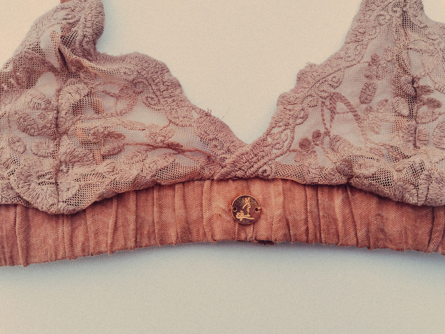 Delicate Light pink ladies bralet made of lace and linen fabrics. The item is designed and manufactured by South African clothing designers.